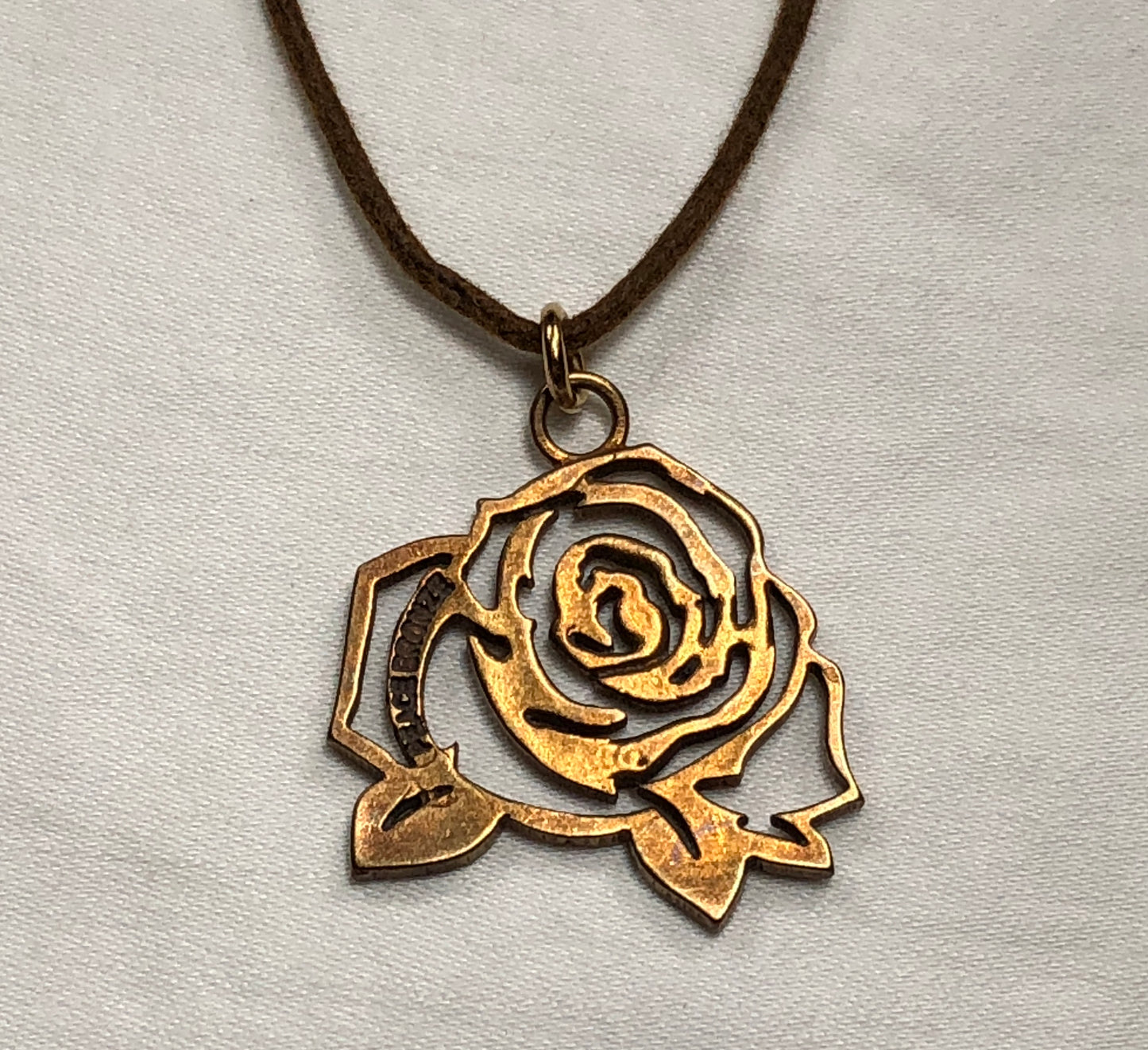 The Mighty Rose Pendant Necklace in Bronze Finish on Adjustable Natural Fiber Cord