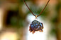 Mighty Rose Filled-In Pendant Necklace in Iridescent Finish on Adjustable Natural Fiber Cord
